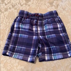 NWOT Carter’s boys swim trunks.